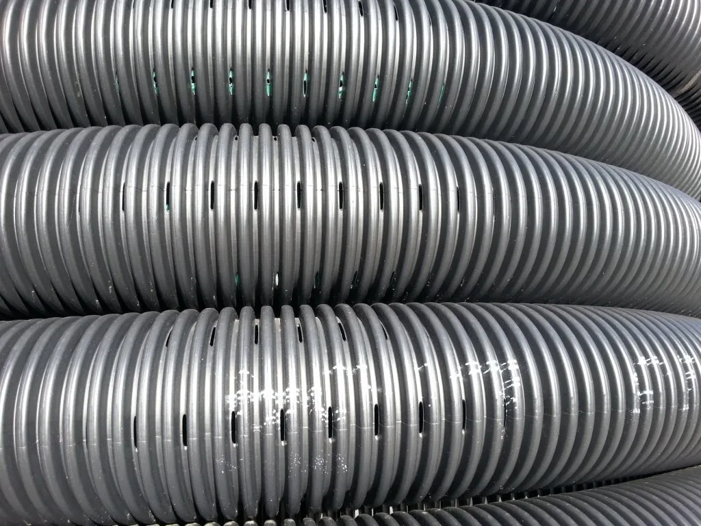 TUBO DRENAGGIO DOP. PARETE D. 110 in rotolo ml.25 lin. arancio fori 180°